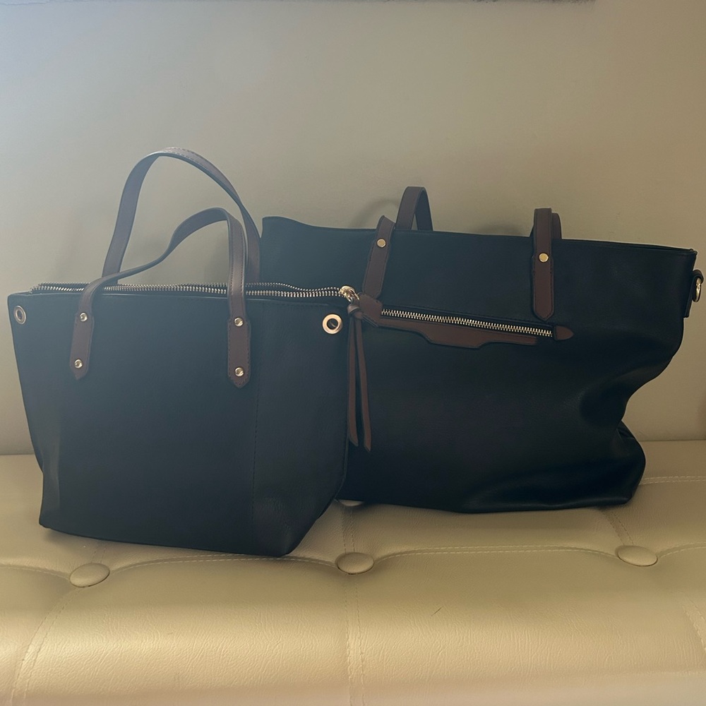 2 black nesting handbags